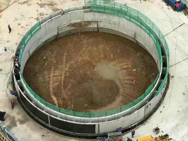 沉井式地下圆筒形立体泊车库是如何建成的？